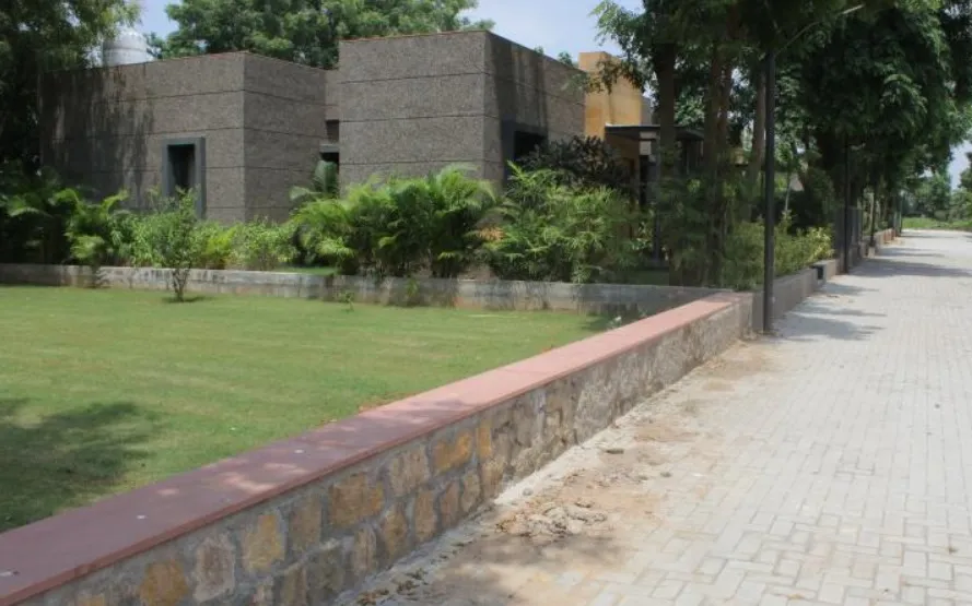 Best Stone Boundary Wall project by Stone World